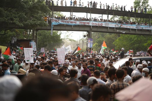 A large pro-Palestine rally in Dhaka, highlighting global solidarity against the Gaza conflict.